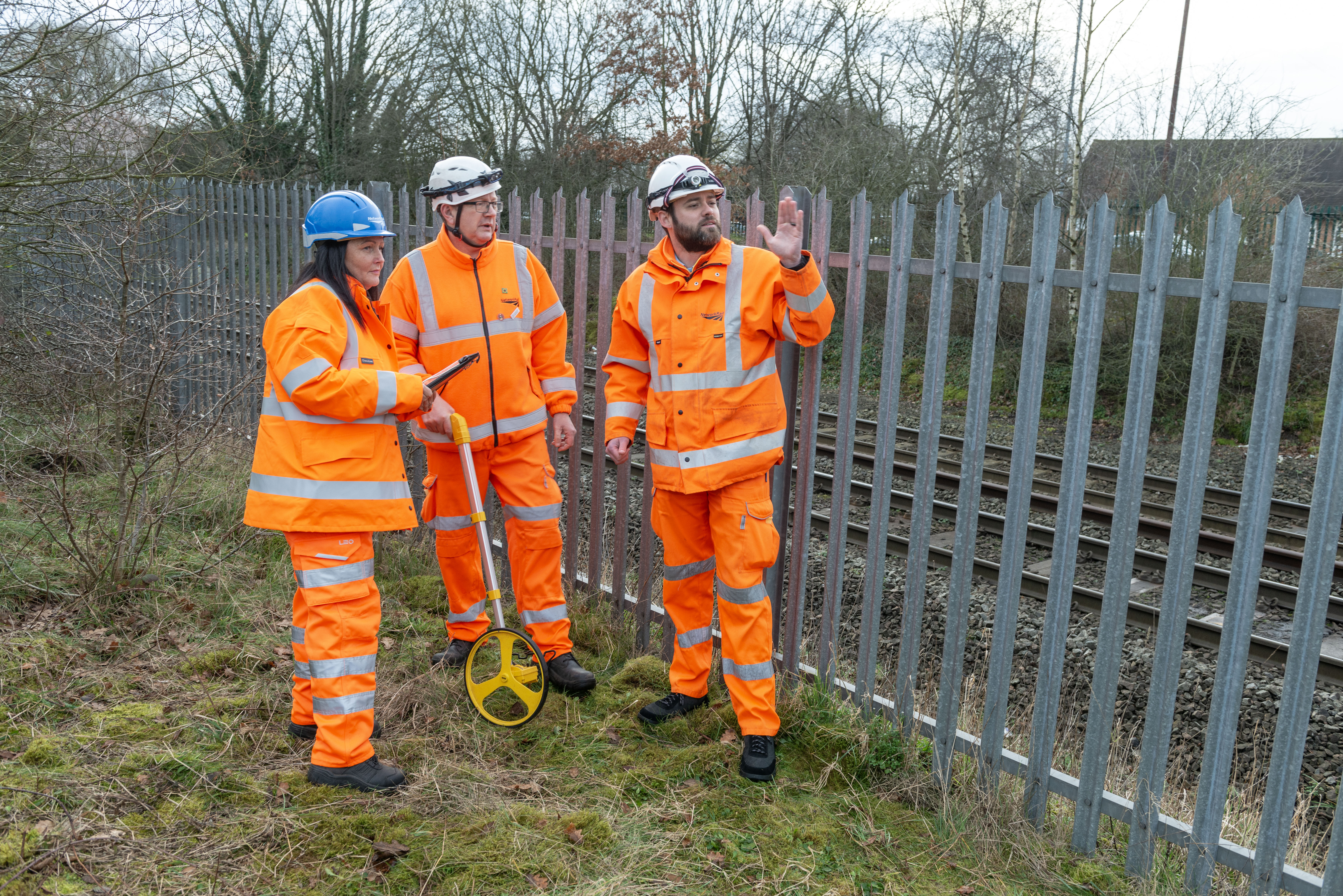 Network Rail staff survey the site