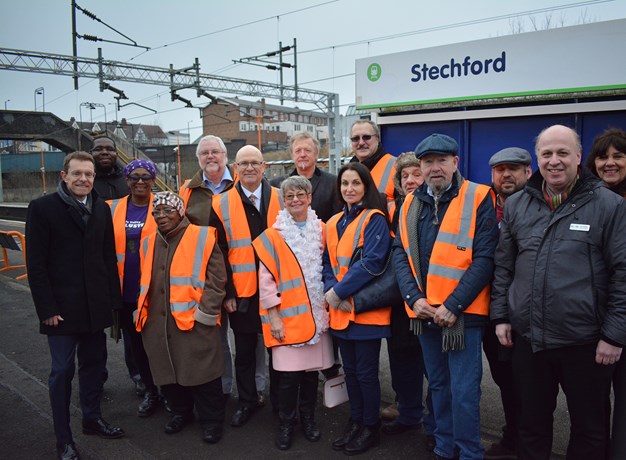 Executives in front of Stechford rail station